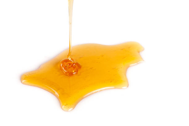istock Honey stain isolated on a white background 696208870