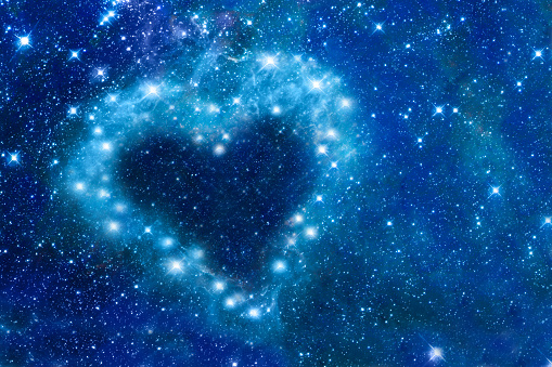 Bright stars in a night sky arranged in the shape of a heart, romantic magic night, love  and Valentines day card