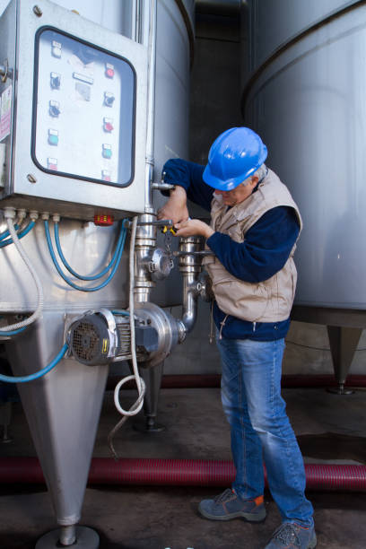istock repairman at maintenance work 696212560