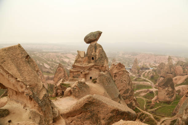 Fairy chimneys with foggy weather in Cappadocia, Turkey