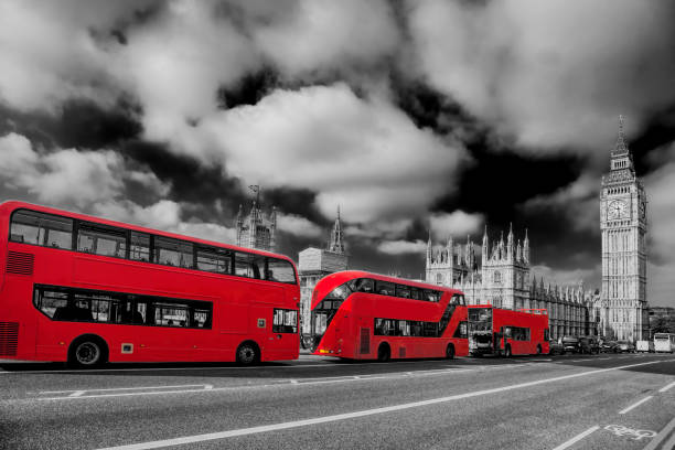 istock London with red buses against Big Ben in England, UK 696220186