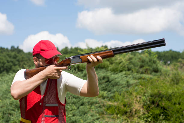 istock Man shooting skeet with a shotgun 696220250