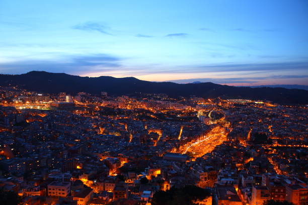 istock Barcelona sky line view at night from Bunker del carmen 696220890