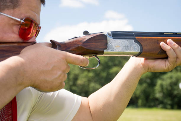 istock Man shooting on an outdoor shooting range 696221078