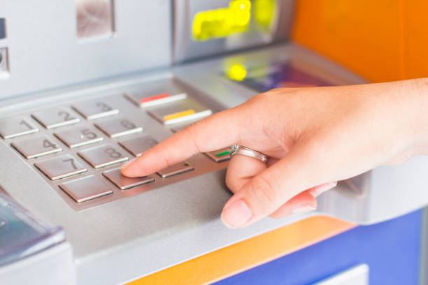 istock Financial transactions via ATM. 696224038