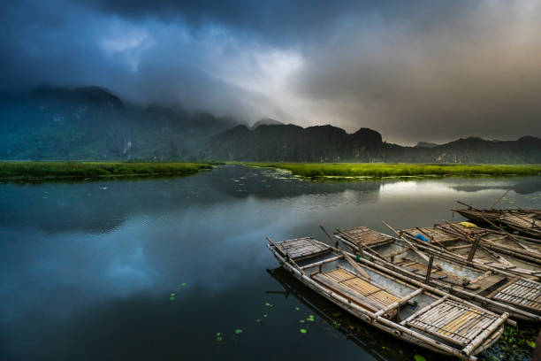 istock Early morning on Van Long lagoon with many fog 696230648