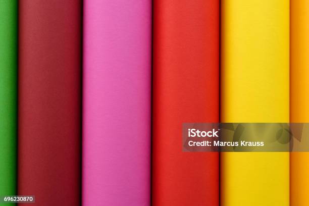 Rolls Of Colored Paper In Green Brown Pink Red Yellow And Orange Stock Photo - Download Image Now