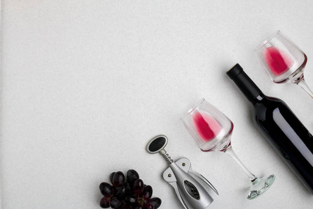 istock Wine, glasses and corkscrew over white background. Top view 696234828