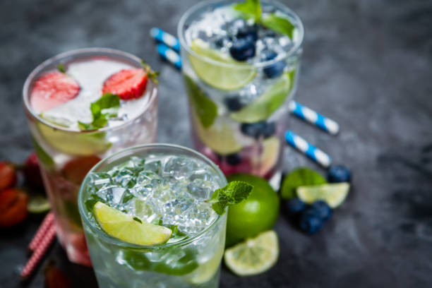 istock Selection of colorful mojitoes in glasses 696242996