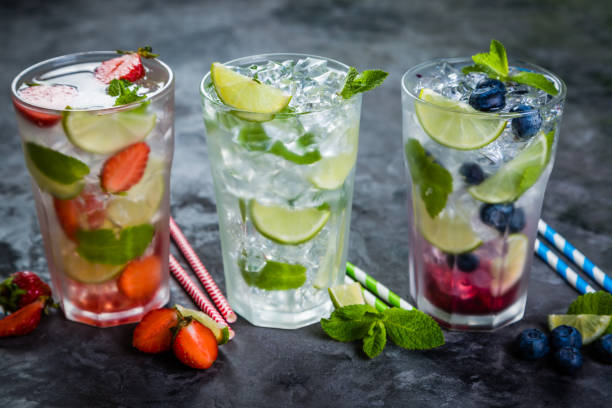 istock Selection of colorful mojitoes in glasses 696243112