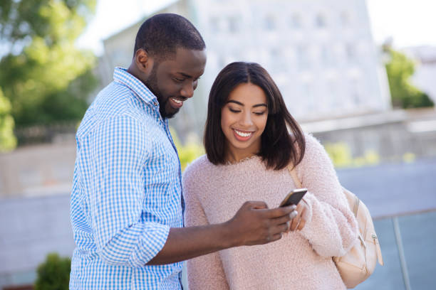 istock Cute young couple looking for a place to go 696243300