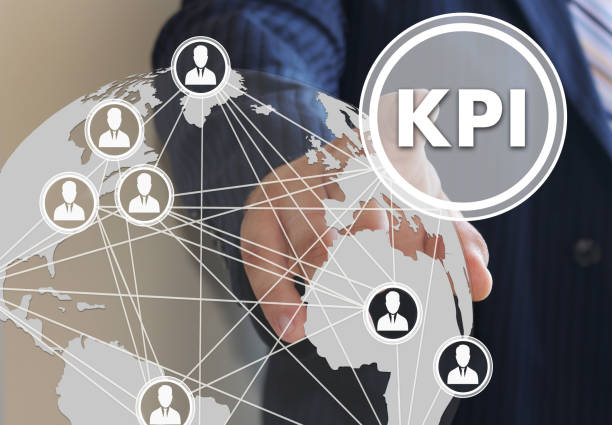 istock The businessman  clicks the button KPI, Key Performance Indicator on the touch screen in the global network. 696246732
