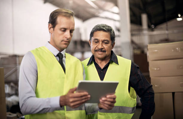 istock Using the latest software to manage factory floor information 696247596