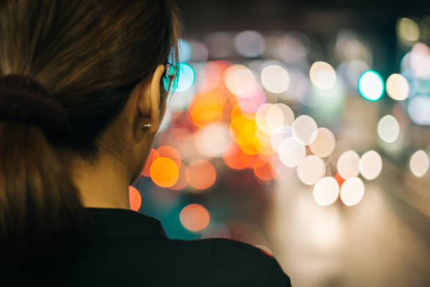 istock Image Of Woman Against Defocused Background 696248041