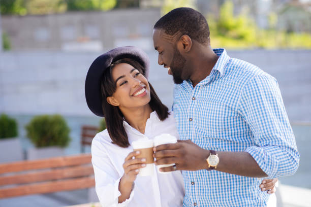 Young confident couple feeling happy and relaxed together