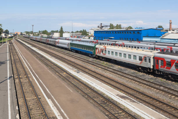 Passenger trains at the railway station Kotlas South Arkhangelsk region Kotlas, Arkhangelsk region, Russia - August 12, 2016: Passenger trains at the railway station Kotlas South Arkhangelsk region kotlas stock pictures, royalty-free photos & images