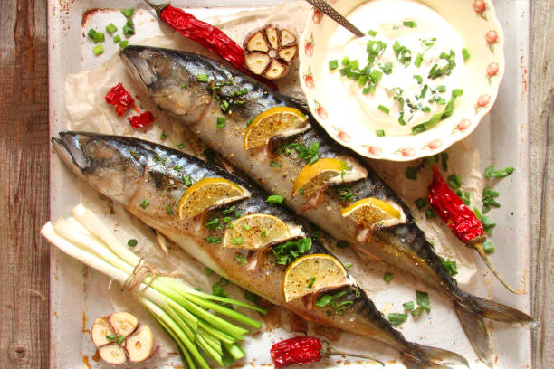 istock Fish baked with lime, peppers and spices 696261422