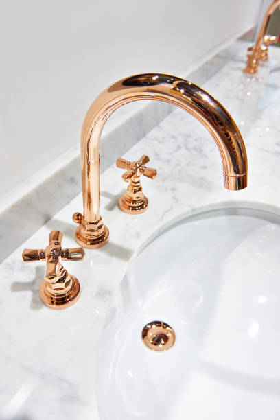 istock Golden cooper water tap faucet 696261918