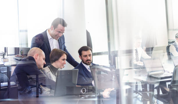 istock Business team working in corporate office. 696265474