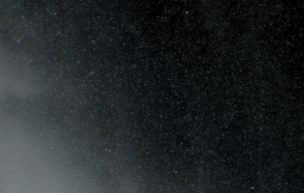 istock texture of water spraying on black background 696265710