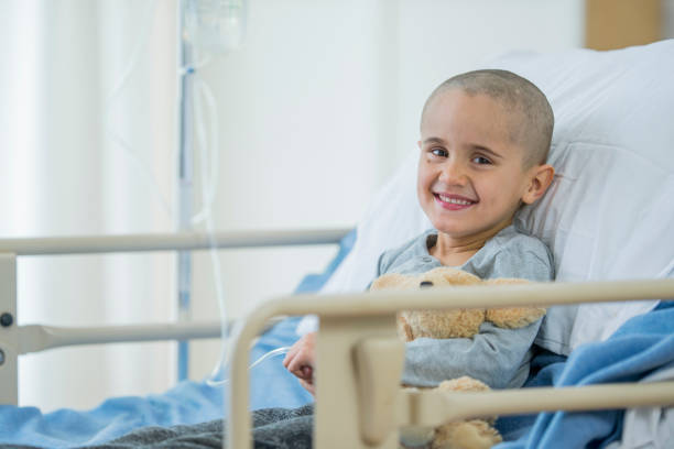 istock Happy Little Boy Battling With Cancer 696274738