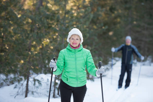 istock Senior couple on ski winter vacation. 696275088
