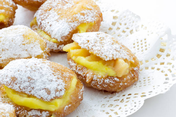istock Handmade krapfen filled with pastry cream 696284464