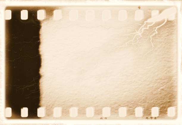 istock Vintage sepia film strip frame. Plaster textured. 696287978