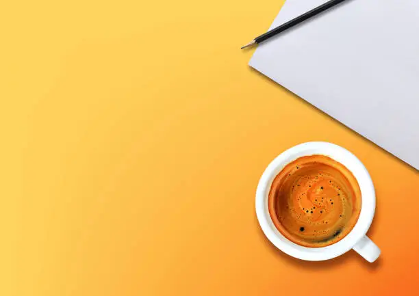 Photo of cup of espresso coffee and note paper on colorful background