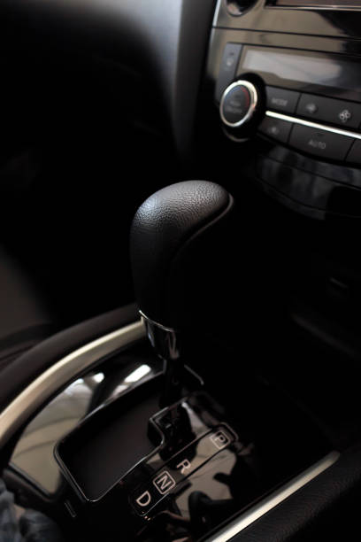 istock closeup automatic gear in new car with soft-focus and over light in the background 696291298