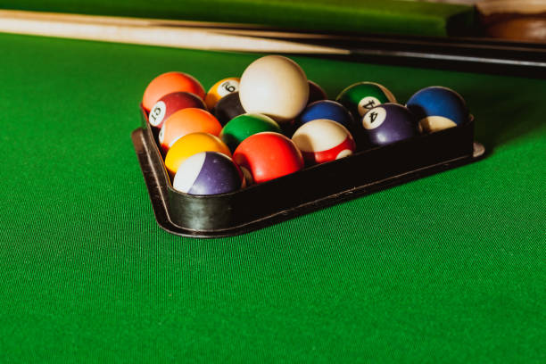 istock Snooker ball and stick on billiard table 696295770
