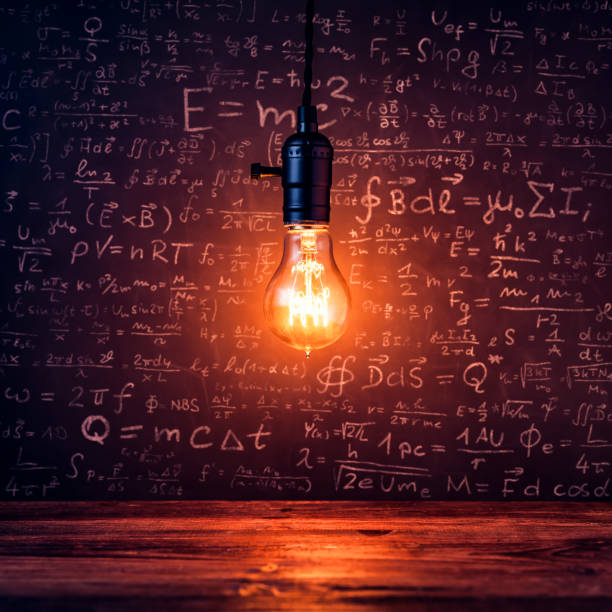 istock Light bulb and formulas on blackboard - Vintage Ideas Grunge 696296062
