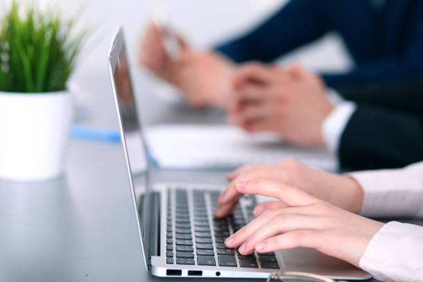 istock Group of business people working together in office 696300876