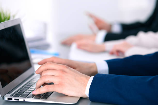 istock Group of business people working together in office 696301014