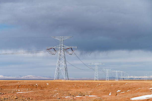 istock power transmission towers on plateau 696301634