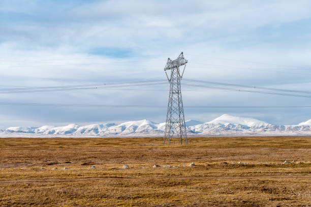 istock power transmission towers on plateau 696303798
