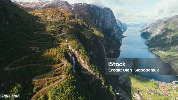Scenic Aerial View Of Lysefjorden And Winding Road Stock Photo - Download Image Now - Norway, Lysefjorden, Forest