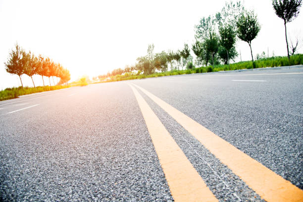 istock Double yellow lines on a road 696307710