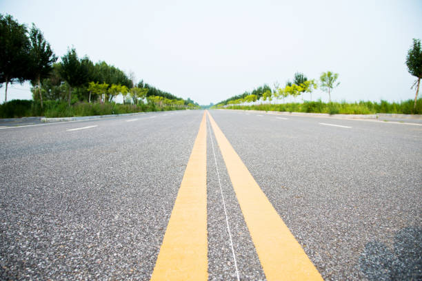 istock Double yellow lines on a road 696307896