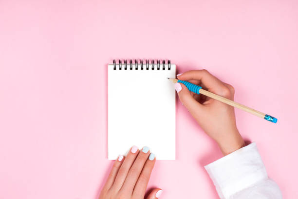istock Spiral notepad with pencil as mockup for design 696307934