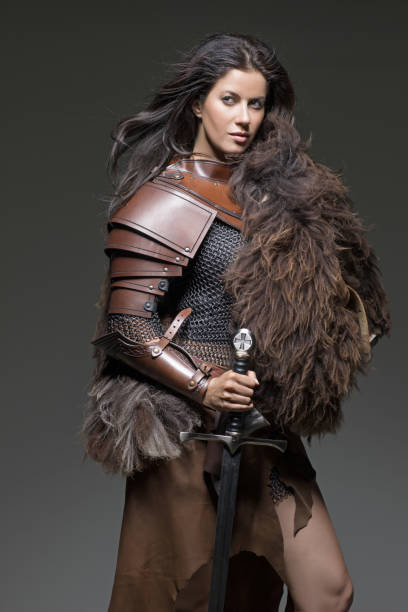 istock Dark Haired Viking Woman in studio setting 696310972