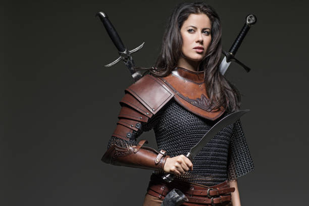 istock Dark Haired Viking Woman in studio setting 696311084