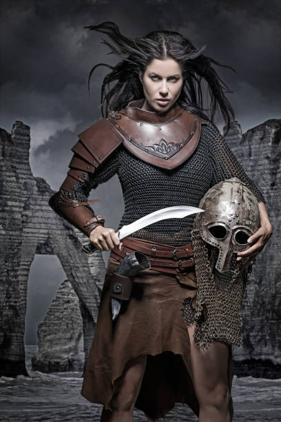 istock Dark Haired Viking Woman in studio setting 696311086
