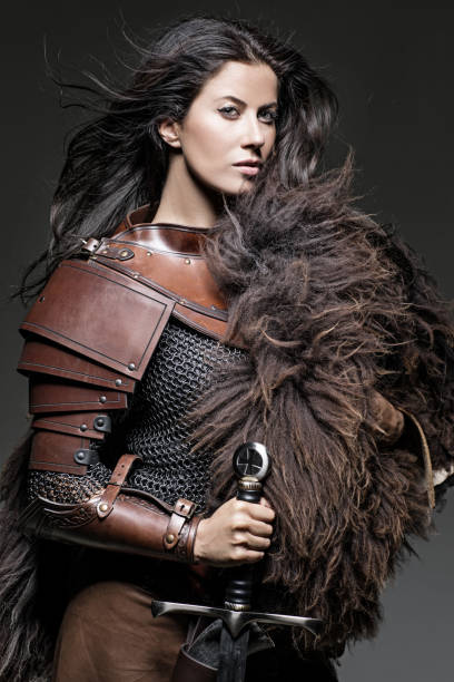 istock Dark Haired Viking Woman in studio setting 696311134