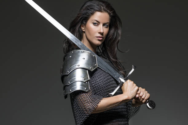 istock Dark Haired Viking Woman in studio setting 696311138