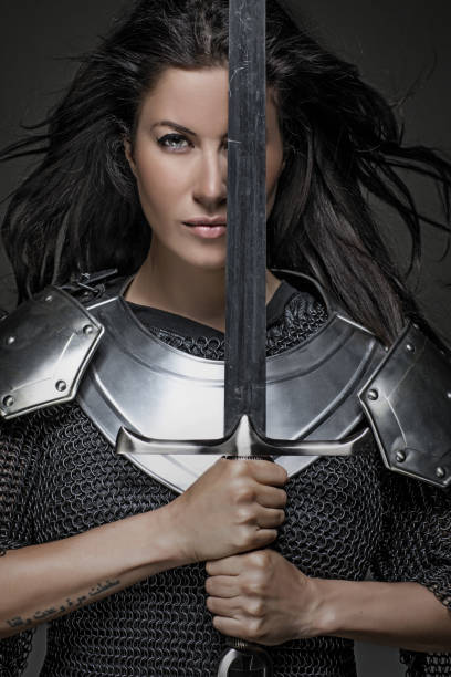 istock Dark Haired Viking Woman in studio setting 696311194