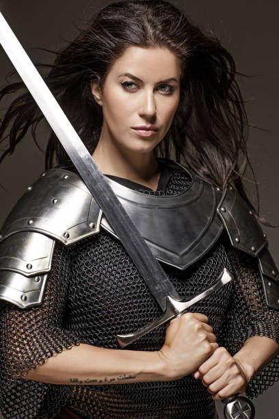 istock Dark Haired Viking Woman in studio setting 696311570