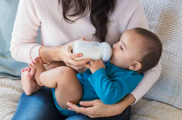 Photo of Infant drinking milk