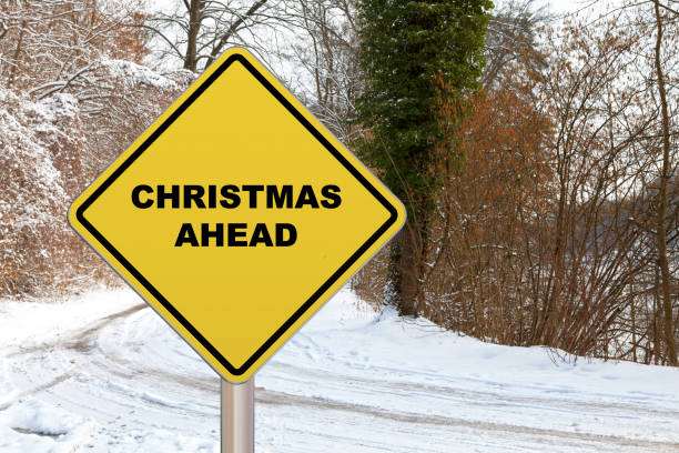 istock Crossing Sign - Christmas Ahead 696313970