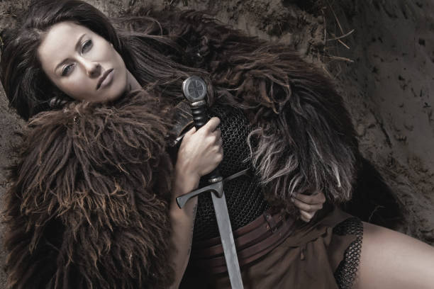 istock Dark Haired Viking Woman in the studio setting 696314082